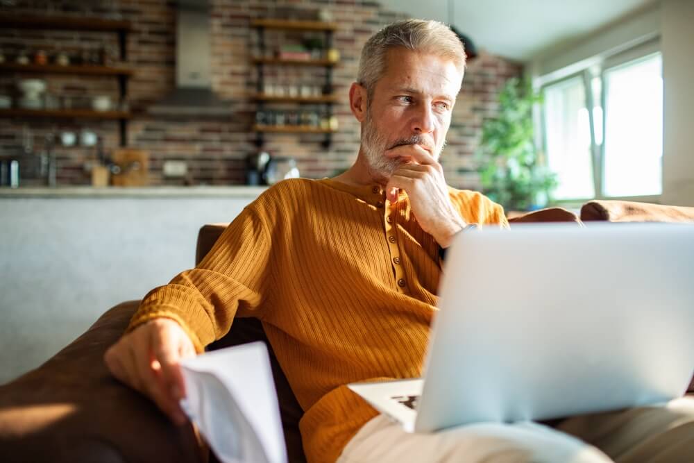 man considering options